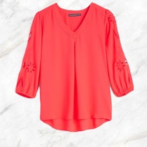 SOLD**Coral blouse with floral cute out